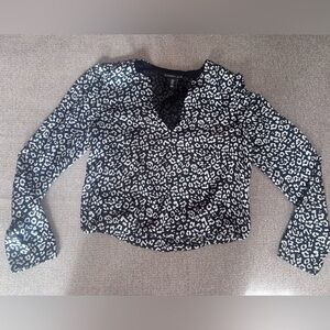 Sincerly Jules Black and White Leopard Print V-Neck Blouse